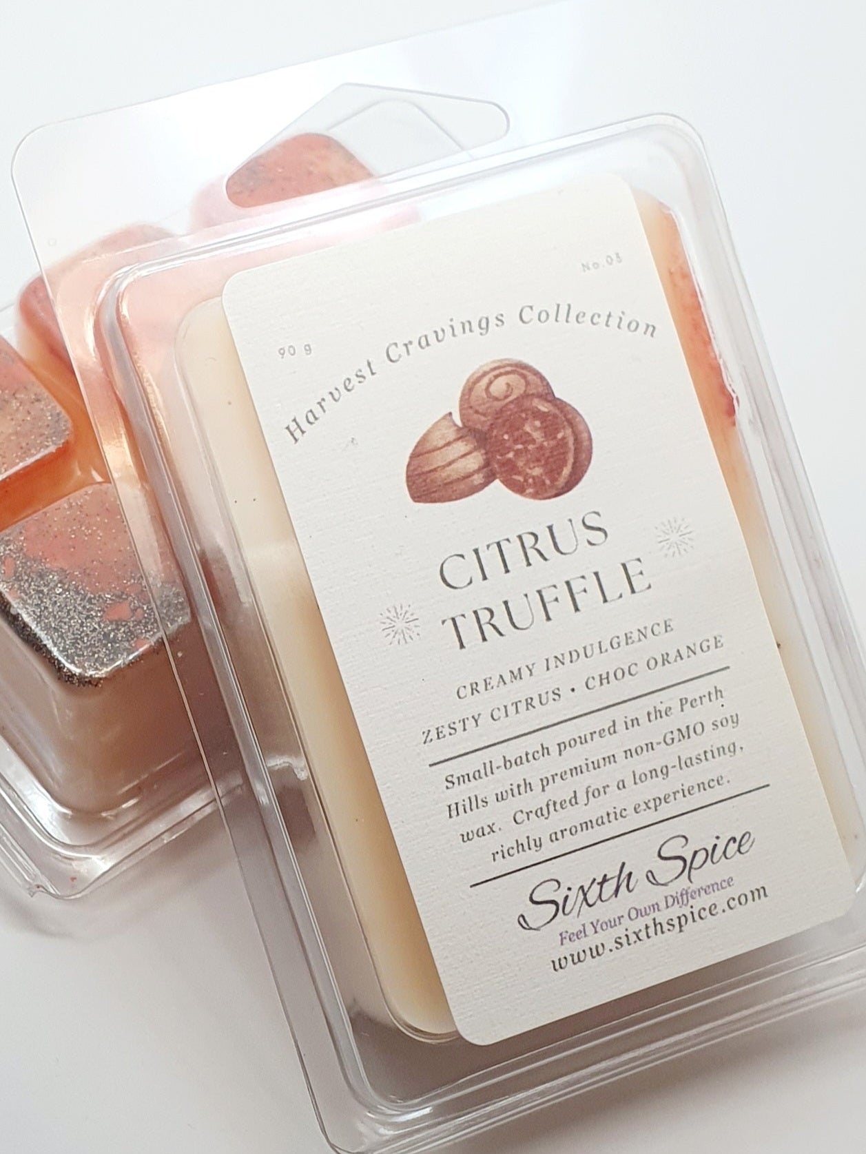 Packaged citrus truffle wax melts with brand label on a white background