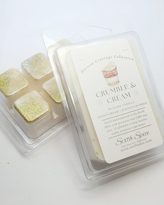Wax melts in a clear packaging with 'Crumble & Cream' label on a white background